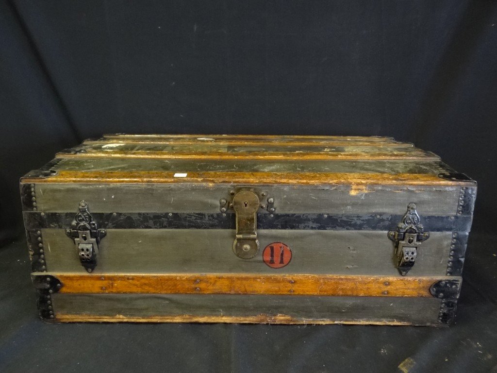Vintage Trunk with contents: Leather and brass mounts; 12.5in. H. x 33in. W. x 19.5in. D.