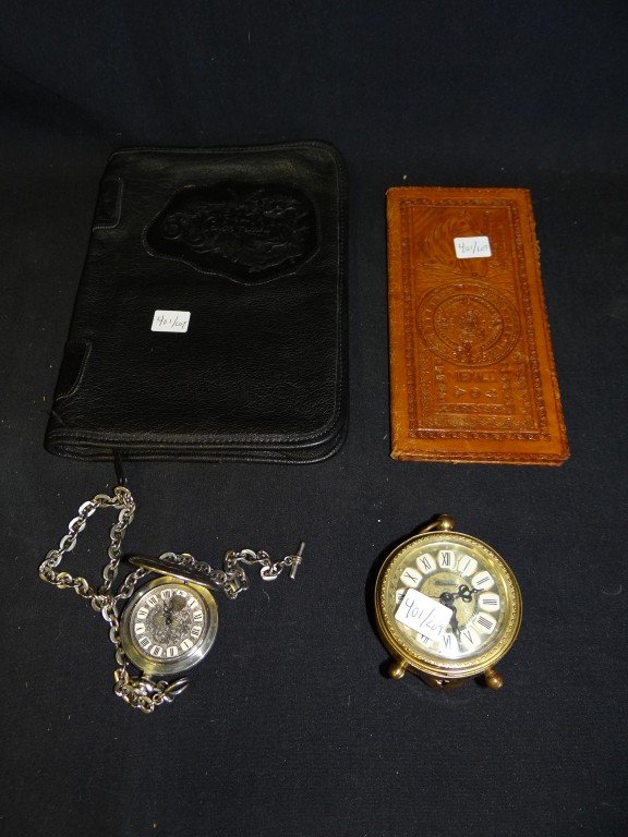 Carlos Falchi Purse & Other Collectibles: A Carlos Falchi leather purse, signed together with a Mexican leather billfold; a Blessing West German alarm clock; a collectible Discovery Day hunting case watch and two Gourd instruments.