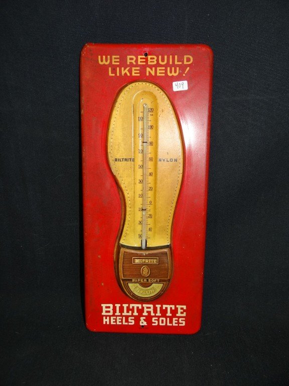 Biltrite Heels and Shoes Adv. Thermometer: We Rebuild Like New! Biltrite Heels & Soles Thermometer. The shoe sole with raised heel houses the thermometer. Advertising sign on tin. 13 1/4"L x 5 3/4"W