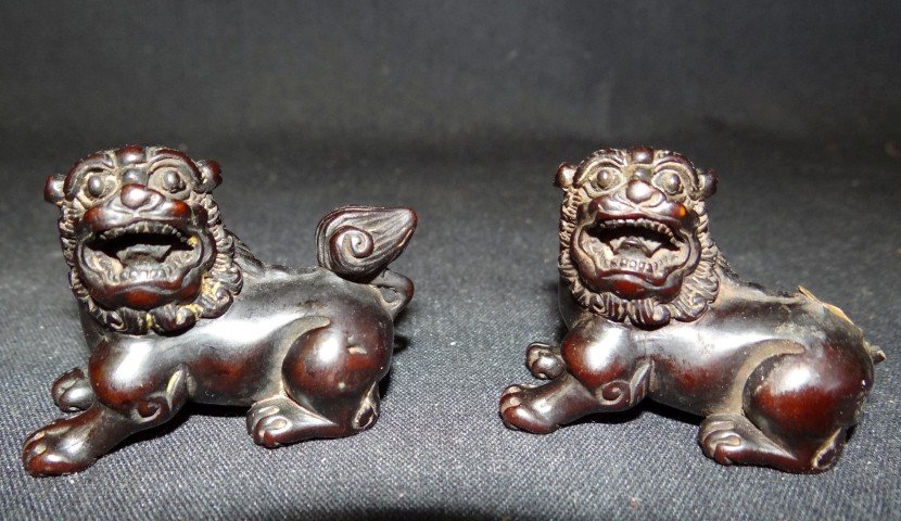 Two Carved Wood Dragon Netsukes: With calligraphy marks. One tail with a small chip. 2"L. "