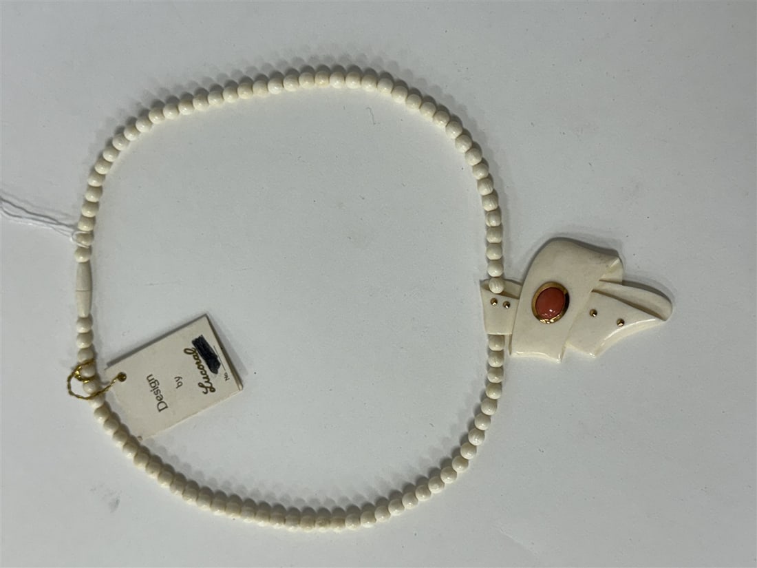 Lucoral Necklace. Coral and Ivory: Never worn with original tag and price $139 Marked with a gold number at the backside.