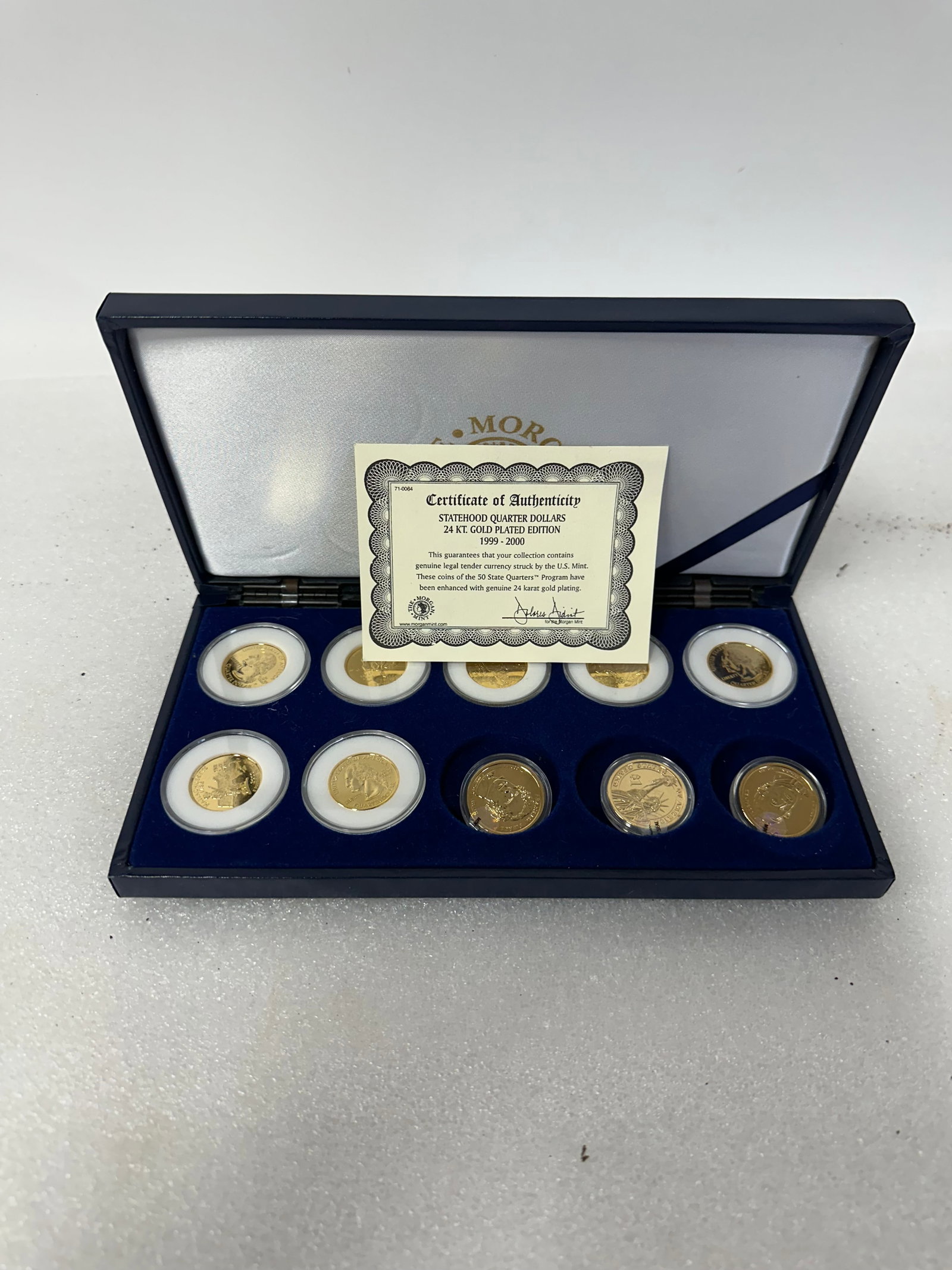 22K GP Ten Statehood Quarter Dollars: 24 Karat Gold Plated Edition 1999-2000 Ten Statehood Quarter Dollars In box 7 and 3 As pictured