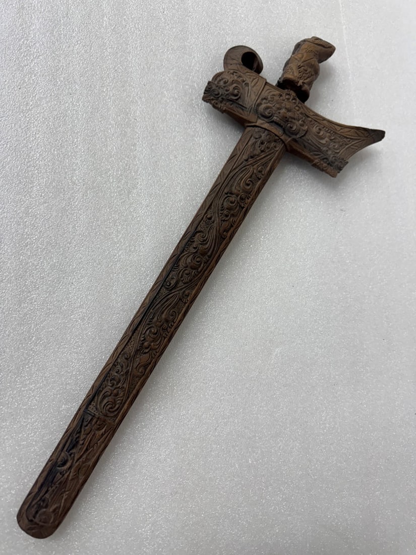Early Asian Wood Sheathed Dagger: Highly carved wood sheathed dagger; 22in.H.