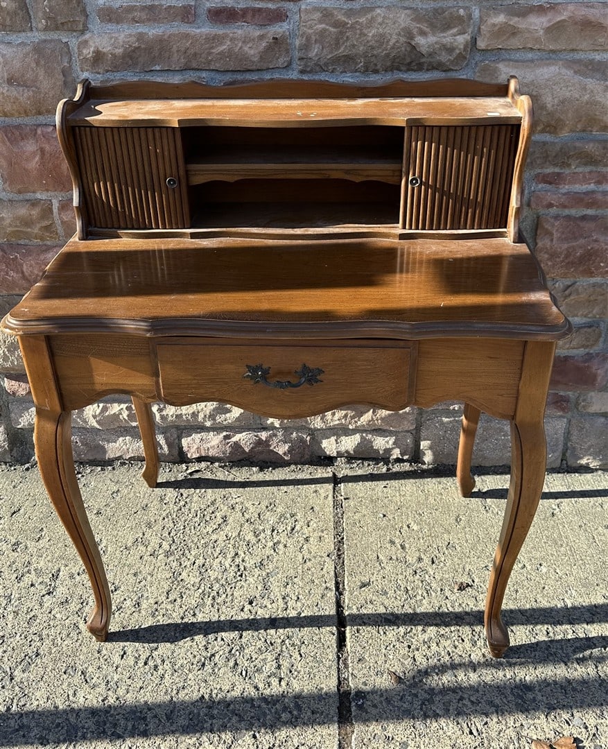 Mahogany Ladies Desk: Diminiutive mahogany ladies desk. One-drawer with tambour sides; 39in.H. x 32in.W. x 20in.D.