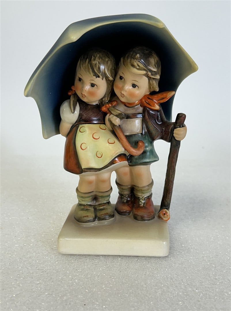 Hummel Figure. Under the Umbrella: 6"H