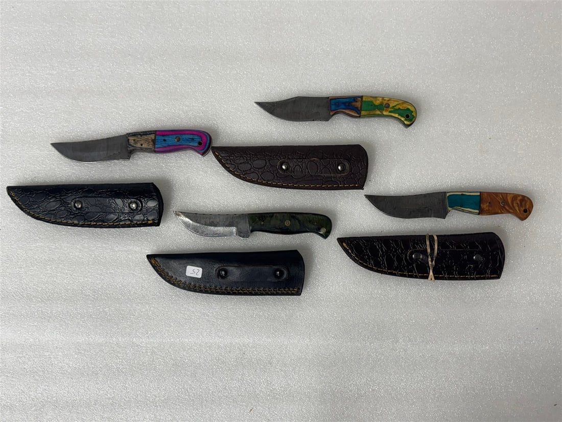 Damascus Steel Knives in Sheath s(4): All different. Varying sizes. Custom made. Four in the lot. As pictured
