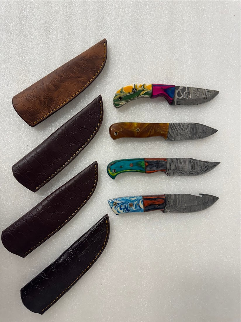 Damascus Steel Knives in Sheaths (4): All different. Varying sizes. Custom made. Four in the lot. As pictured