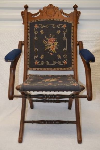 Victorian Wooden Folding Chair by Philander Derby: Maple with needlepoint seat and back. Marked Philander Derby, Gardener, MA Patented Oct. 3, '76. No 576. 32-3/4" high when opened.