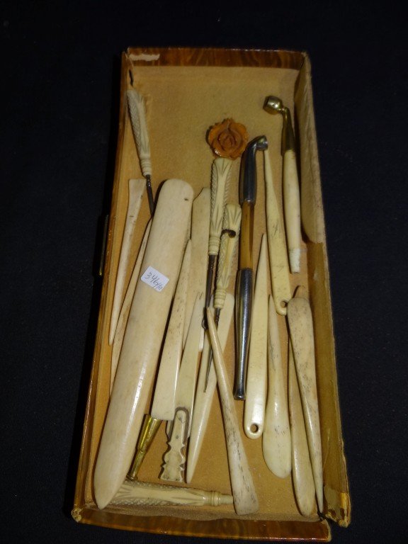 Lot of miscellaneous ivory pieces: Including: sail maker's tools(18 pieces), two(2) opium pipes