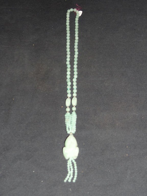 Chinese carved jade necklace: Carved jade bead necklace. Frog drop pendant. Gold beads; 28in. D.