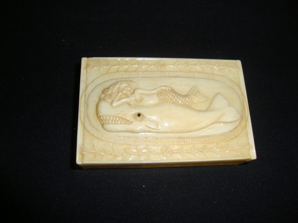 Marine Ivory Box: Carved at the top with a depiction of a whale and a mermaid. Hinged. 3 1/4" W. x 2 1/2"D.