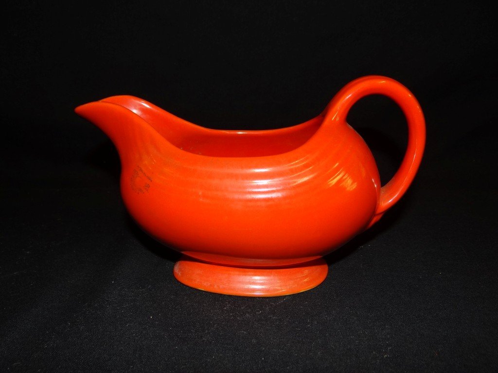 Fiestaware gravy boat: Red glazed gravy boat; 3.5in. H.