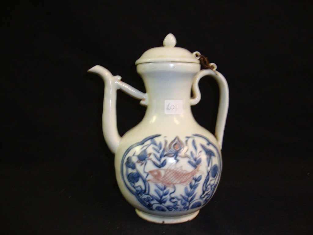 Chinese Pottery Teapot Ming Dynasty: Marks on the handle. Decorated with fish and sea life. 9"H.