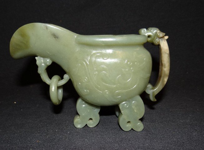 19th C. Chinese carved jade cup: Carved jade cup. Dragon handle and decoration; 3.75in. H.