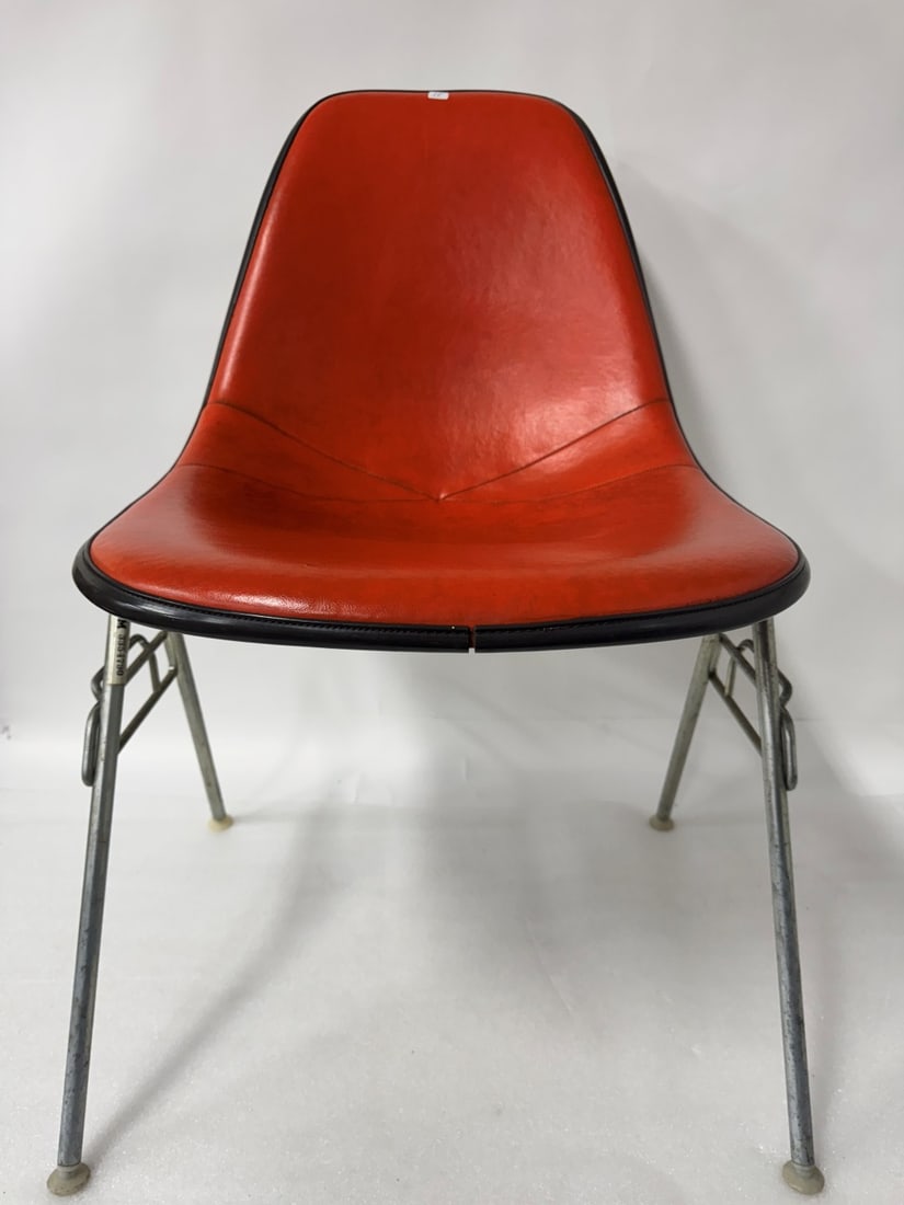 MCM Herman Miller Chair: Single Orange Seat.-Black Frontispiece. 30.75"H by 18.5"W