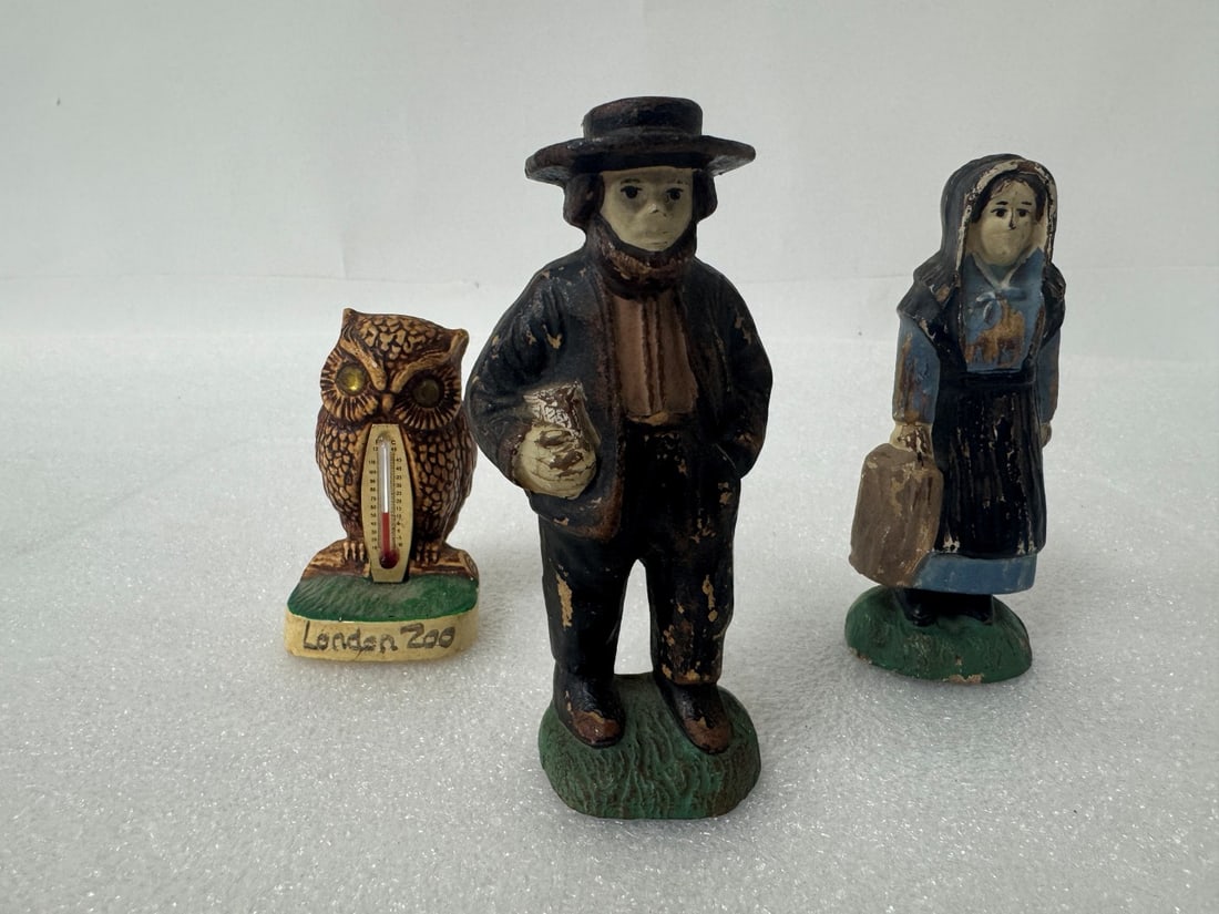 London Zoo Owl Thermometer & 2 Other Figures: A London Zoo Owl Thermometer . Pottery 3"H and Included in the loti s a pr. of Amish figures. Three items in the lot.