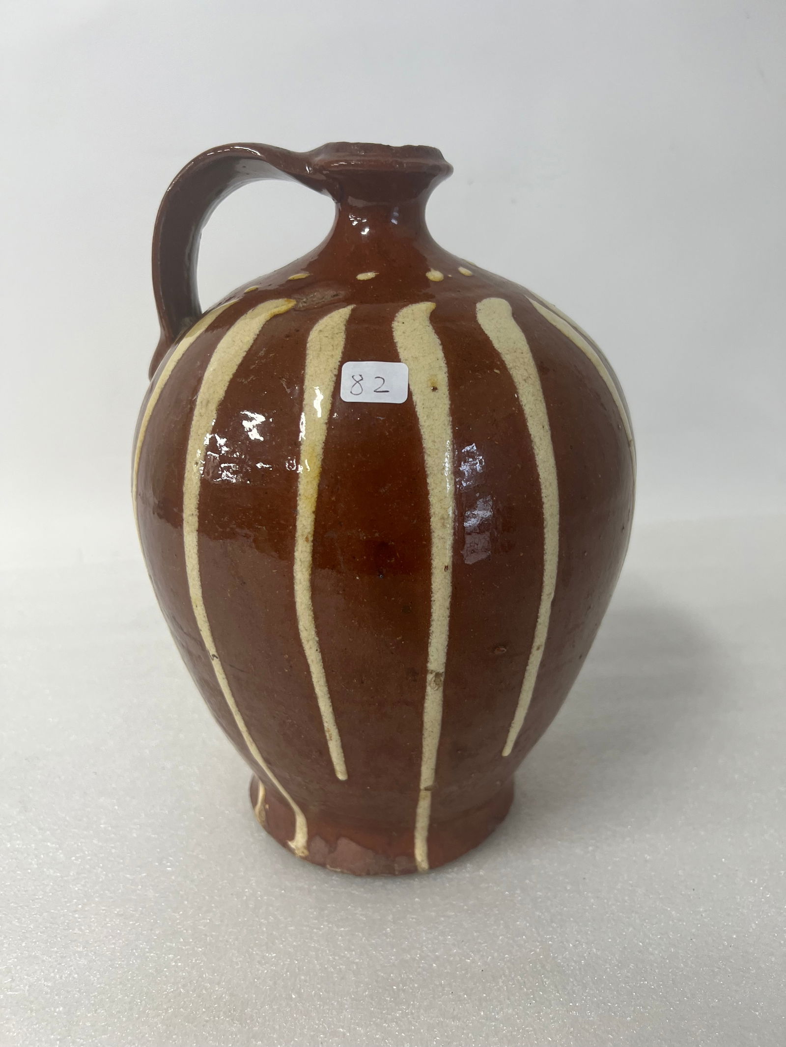 Antique Brown Pottery Striped Handled Jug (1 of 2)