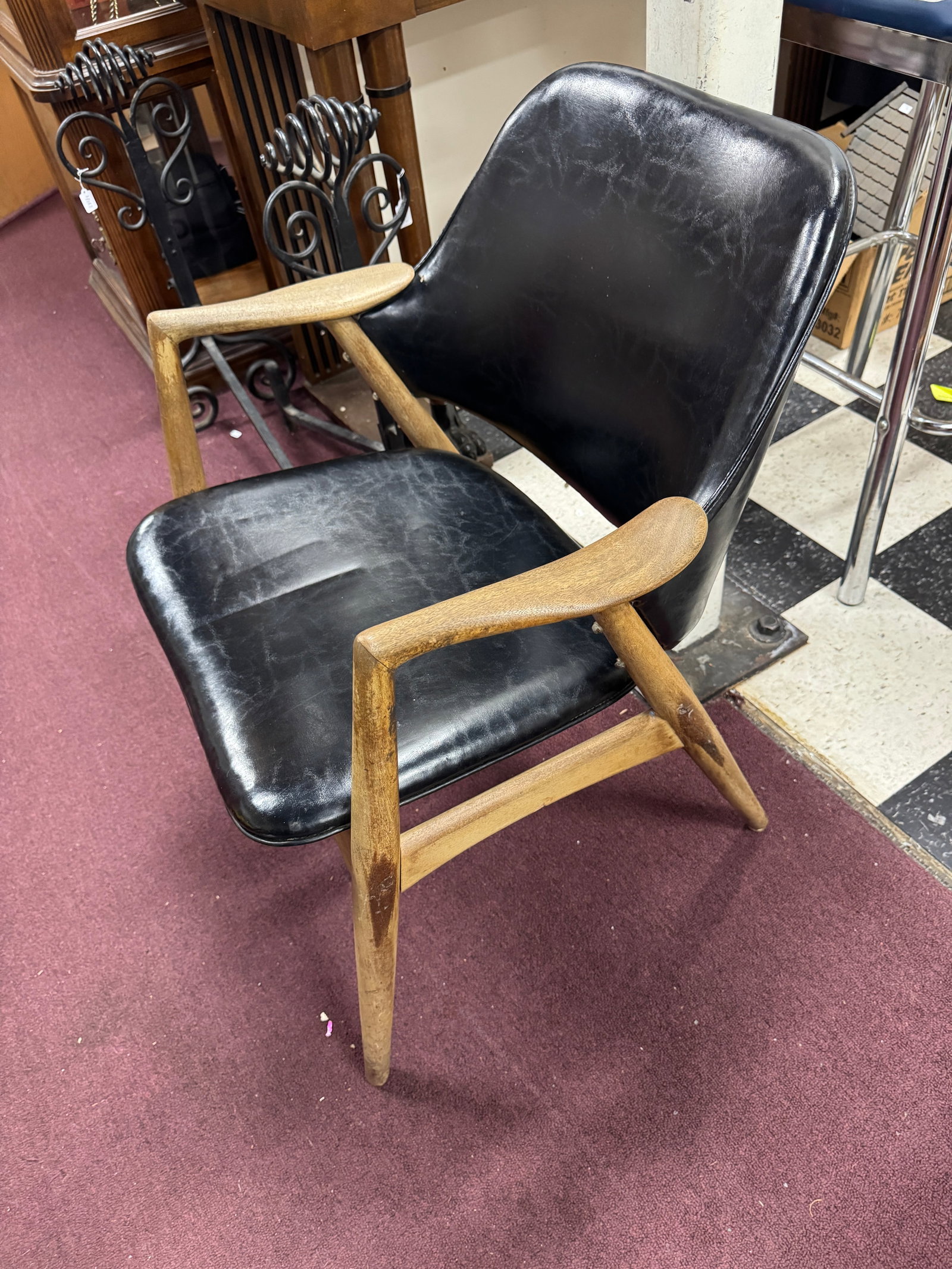 Danish Mid Century Modern Armchair: Marked Denmark on the underside.