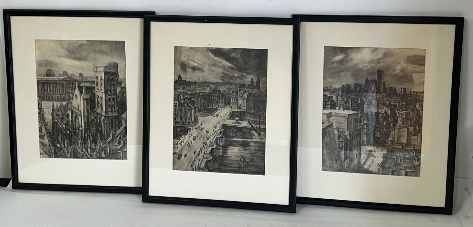 Albert Decaris; Three(3) 20thC. French Lithographs: Three(3) framed gravure lithographs. Paris Saint Medard Church, Paris Pont, Paris Street. Signed in the plate; 18.5in. x 13.5in.(each framed)