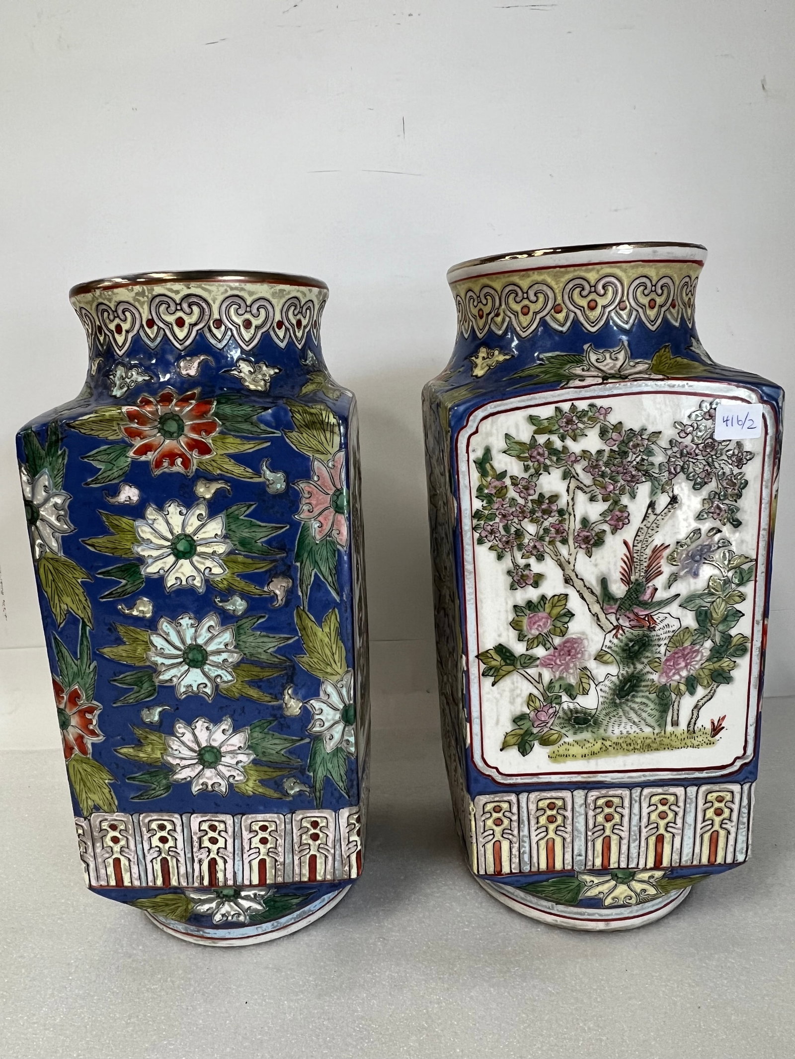 Pr. Oriental Vass: Interior floral decorations at the inside rim Hand painted decorations of blossoms and birds. Footed bottom 14 1/2"H