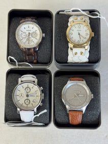 4 Fossil Wrist Watches. New in Cases