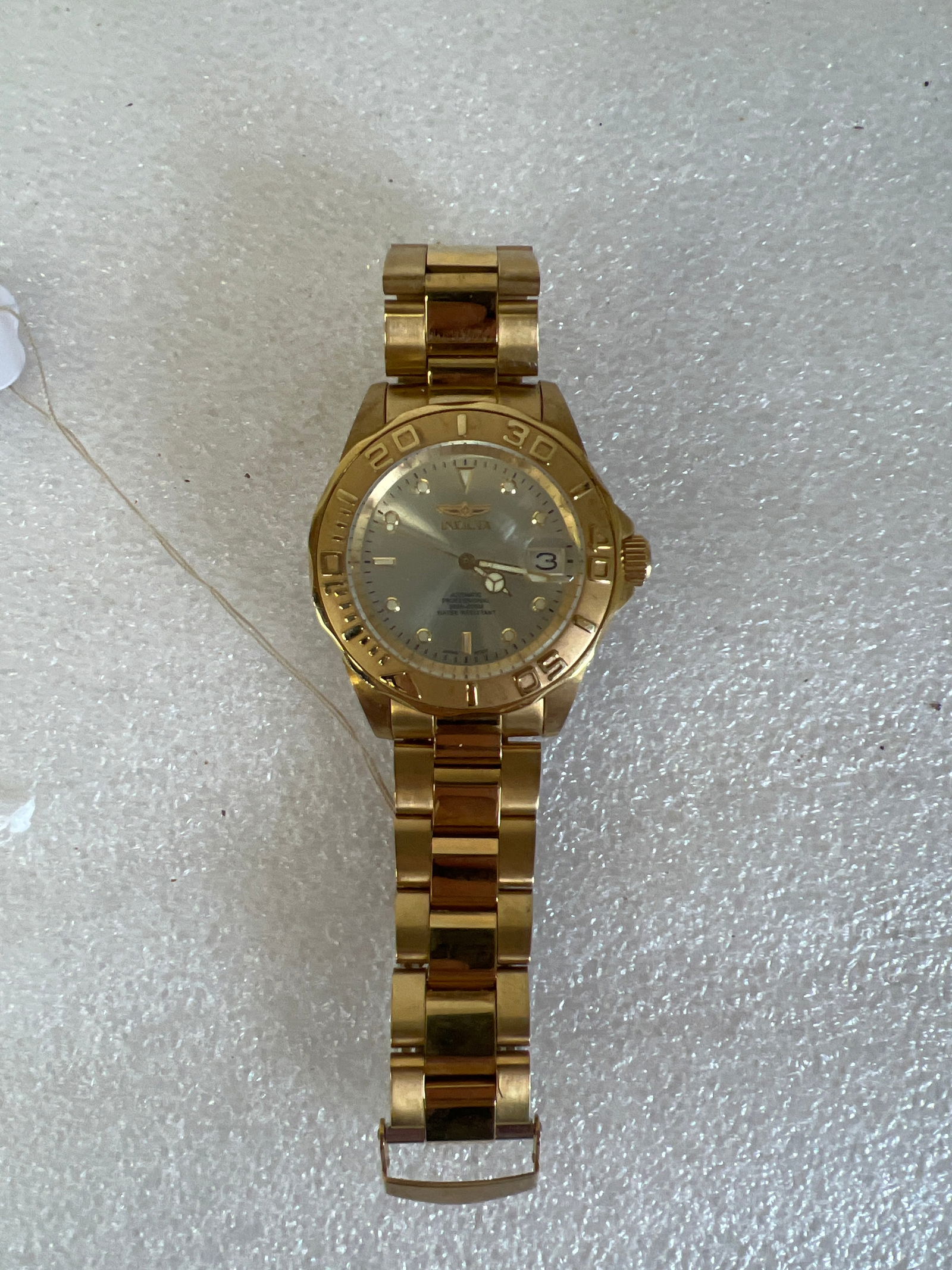Invicta Wrist Watch. Working Condition): Automatic. Gold colored. Excellent condition without scratching on the crystal.
