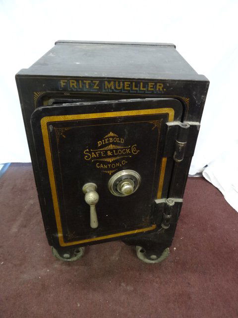 Irving Klaw's Safe from Movie Star News: One navy colored safe with gold painted accents on wheels, belonging to Irving Klaw. Made by the Die Bold Safe & Lock Co, Canton, O. Included in the lot is the combination to the safe as well as a lot