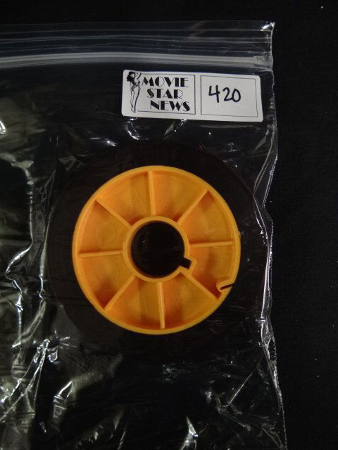 Original Irving Klaw Negatives and Master Reels: Black and white. Gwen shows... Art of Undressing #249. 16mm film negative copies of 8mm films - side x side. 3/8" on large core.