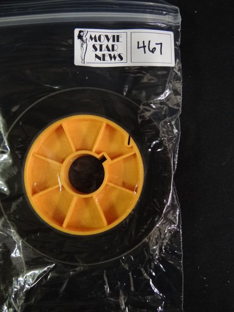 Original Irving Klaw Negatives and Master Reels: Black and white. Wrestling and Scissor Holds (#205) starring Jackie Lens (winner) and Karin Lane (loser). 16mm positive with titles. 3/4" on large core.