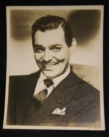 Clark Gable Signed Photograph: Signed in black ink... "To Grace (last name indecernible), always, Clark Gable". Noted on the back of the photograph, Famous Players Studio, signed September 1946. 8x10