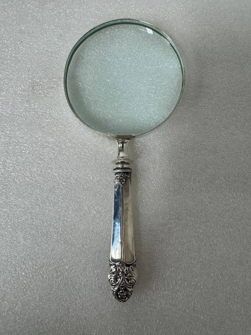 Sterling Silver Magnifying Glass: Marked Sterling on the handle. 9"H