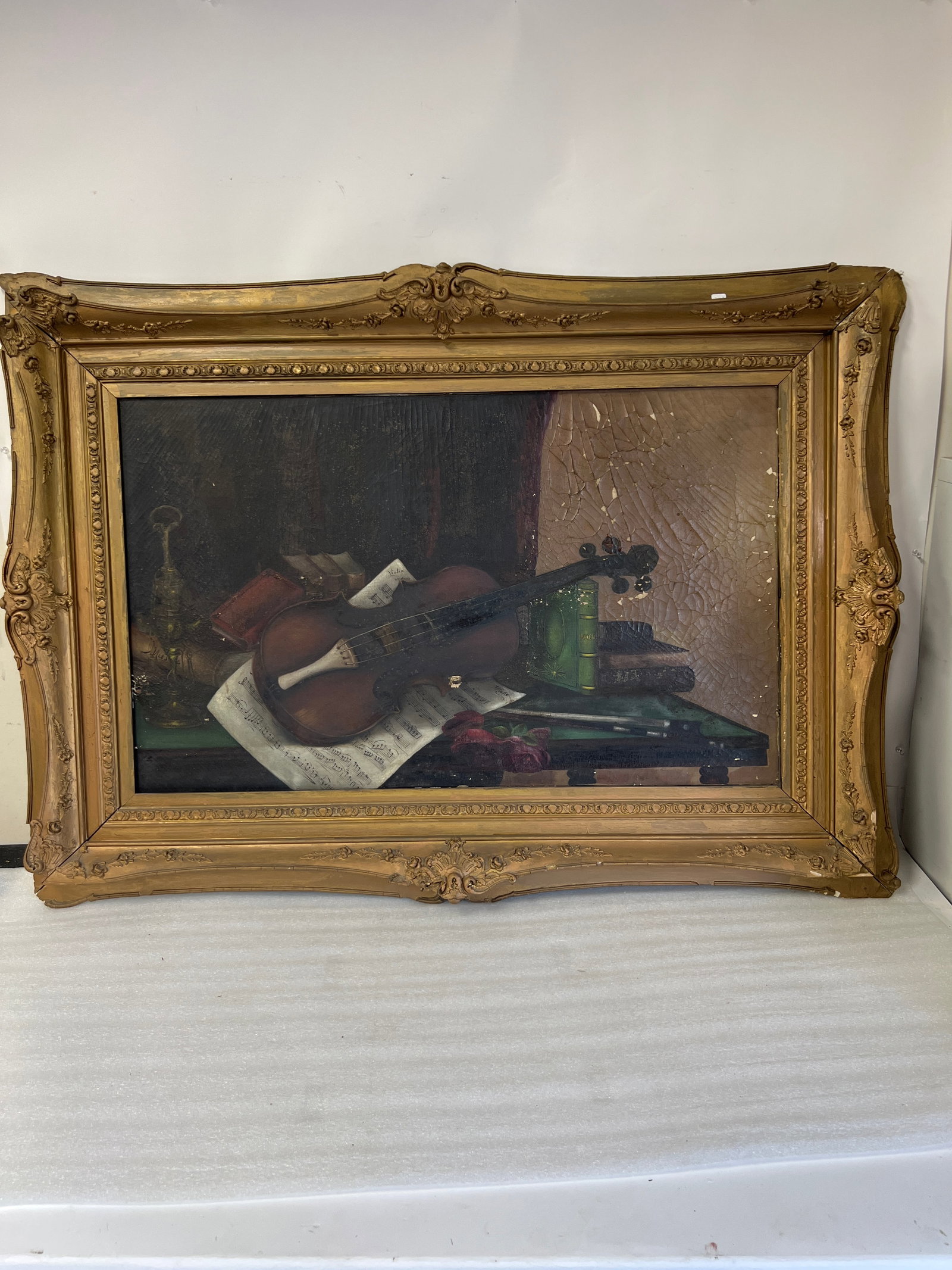 Antique Oil on Canvas Framed: Violin with sheet music. Antique gilt frame. Unframed. As pictured. Needs some restoration. 35"H x 48"W