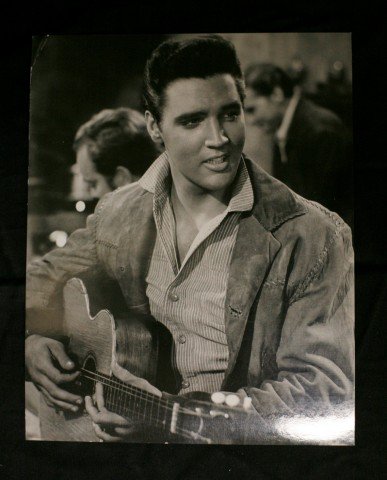 Elvis Presley Portraits and Photographs (8): 1957 close-up portrait; a full length portrait; with Dodie Marshall for CBS Sunday Night at the Movies, Easy Come, Easy Go (with publicity snipe); strumming the guitar in a Victorian decorated bedroom