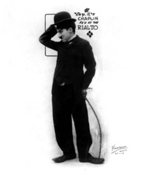 Hartsook Charlie Chaplin Negative: Black and white. Yep, it's Chaplin, He's at The Rialto. Photographer's stamp in the negative. Included in the lot is a print made from the negative. 8x10