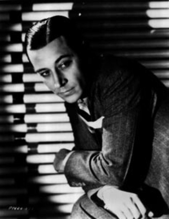 George Raft Original Negatives (16): Black and white. Includes early close-up well lit publicity portraits for Paramount, many probably by the Hollywood Celebrity photographer; dapper gashion shotsl a rarely seen photograph with Gloria S