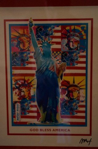 Autographed Peter Max Print: Peter Max: "God Bless America: Memorial to the Heroes and Victims of 9-11, Ground Zero". Signed by Mr. Max and framed. Overall 16 1/4" x 15 1/4"