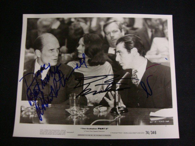 Godfather Part II Signed Photograph: Signed by Best Wishes, Robert Duvall; Diane Keaton; Al Pacino, all in marker on a movie still depicting a scene from the film
