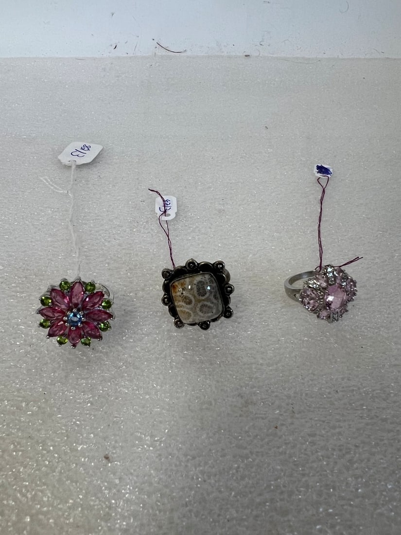 Antique Sterling Silver Rings (3): One with marcasites and onyx; two with pink stones and crystals. Three in the lot.