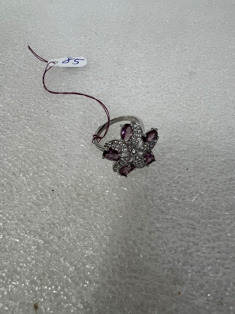 Sterling Silver & Amethyst Ring: With crystals. Marked sterling