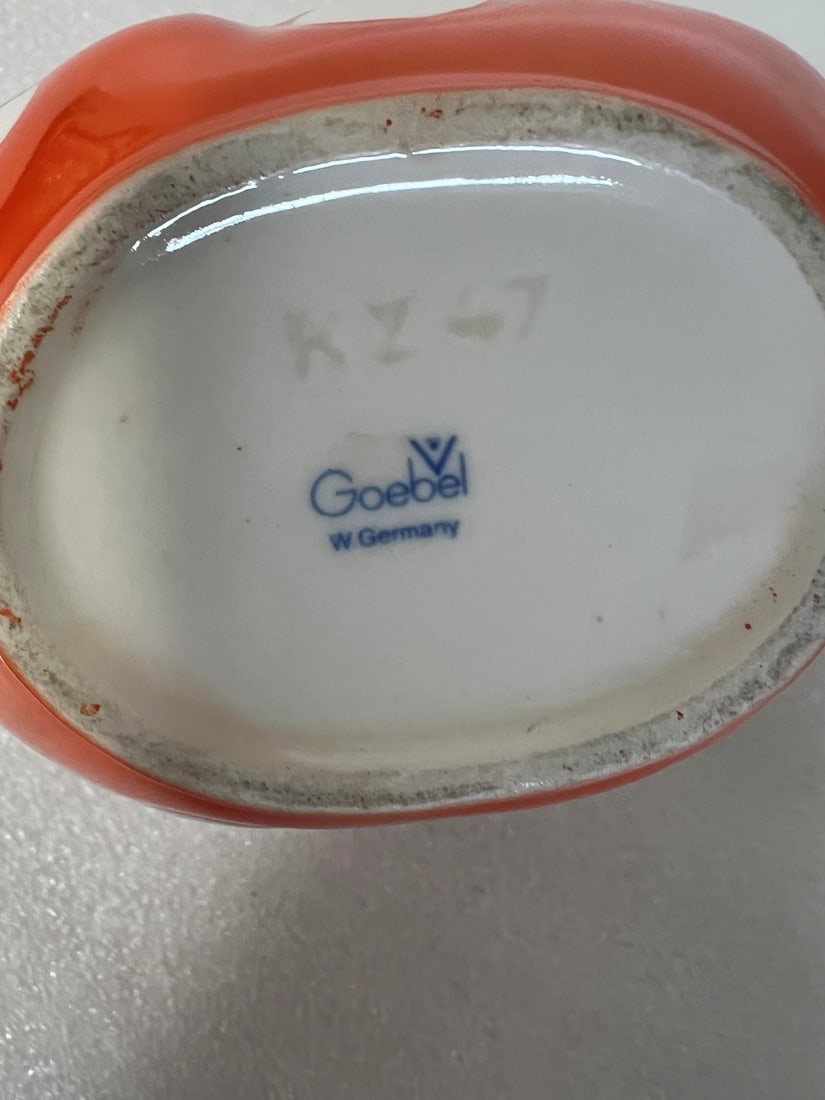 Goebel Tied Kerchief Baskeet: Marked at the underside. 5 1/2"h