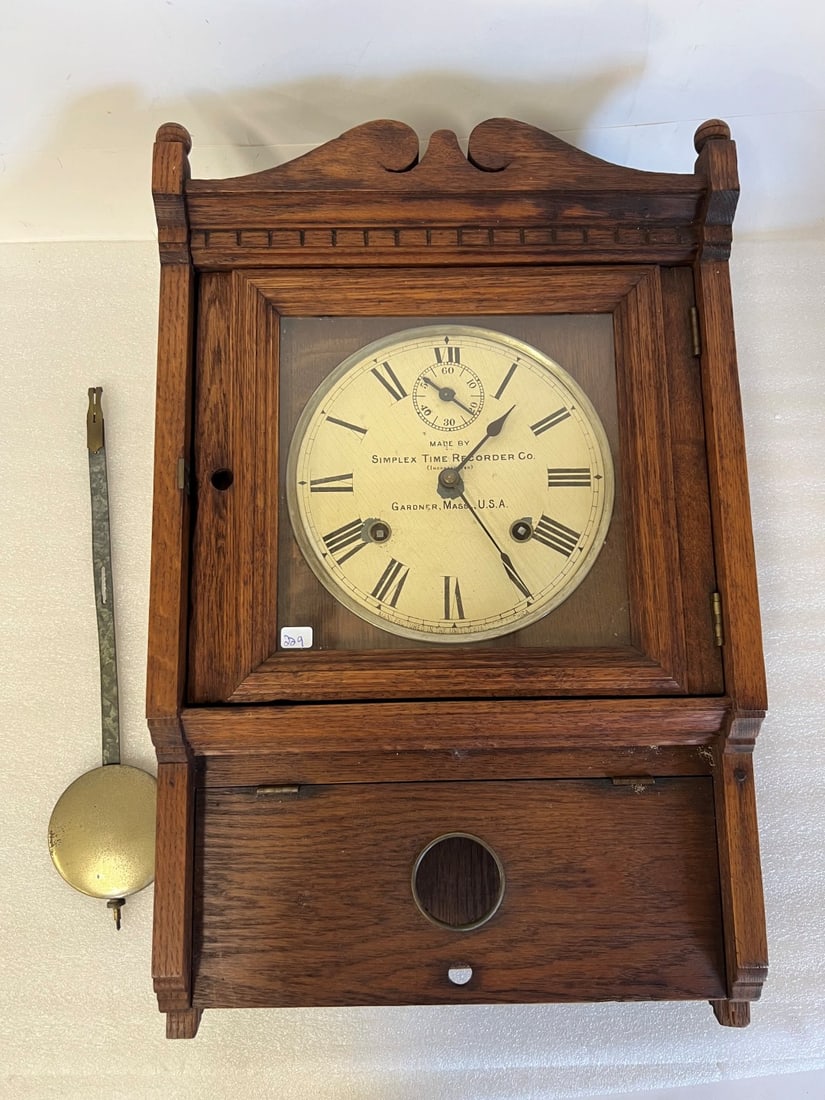 Oak Wall Clock w/Pendulum: Oak wall clock by Simplex Time Recorder Co Gardner, Mass USA As is condition 24"L x 14 1/2"W x 5 1/4:d