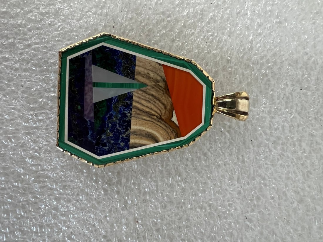 Marcasite Inlaid Pendant: Inlaid Pendant w/sailboat, water and mountains in gold bezel. 2" x 1.25".