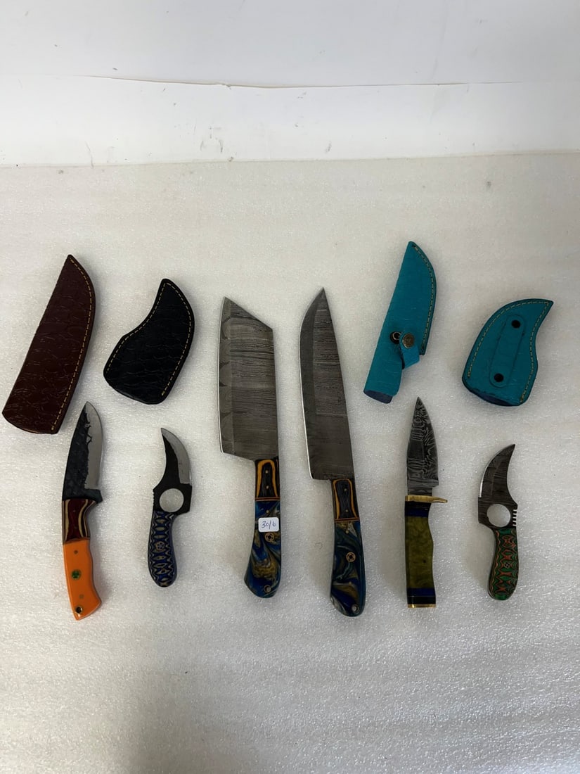 Knives Damascus Blades (6): Varying sizes. 4 are in Sheaths. Largest is 13"L and Smallest is 6"L.