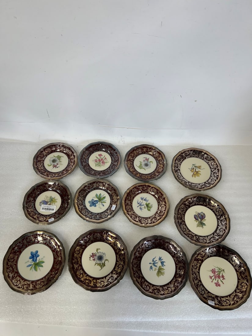 Best Quality Rosenthal Hand Decorated Plates(12): Silver rimmed. Six of the larger 7 1/2"D and six of the smaller 6 1/2"D Twelve in the lot. Chippendale pattern.