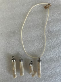 Four White Coral Pendants