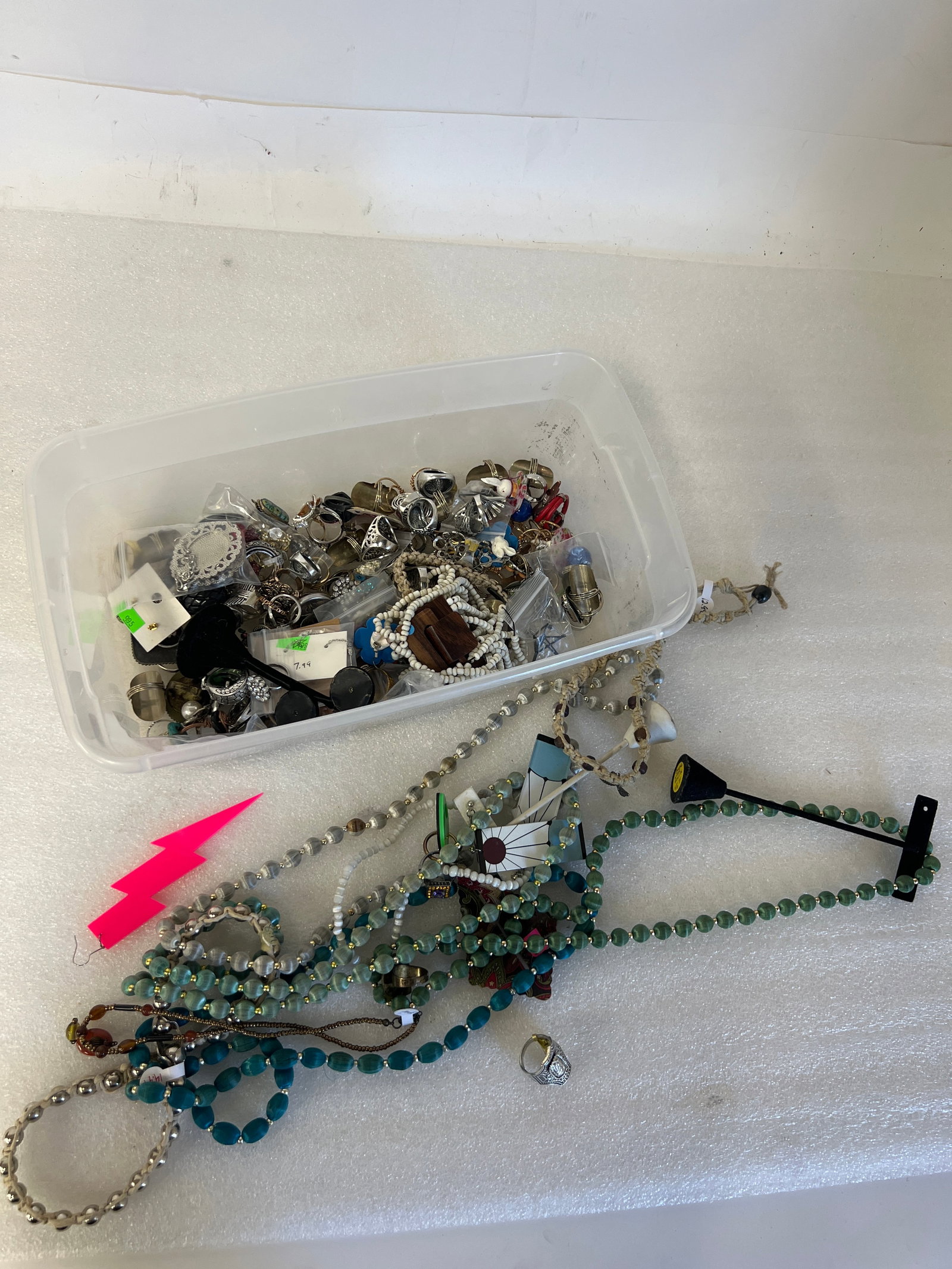 Bin Lot of Costume Jewelry: Rings and other things. Probably 60 or more pcs. Many rings seem to be sterling but none marked