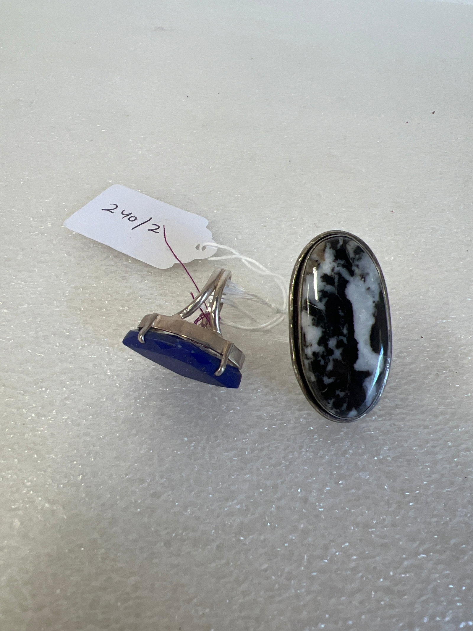 Vintage Sterlng Silver Rings.(2): Large lapis lazulii stone and one with marbleized black and white onyx stone . Both marked for sterling
