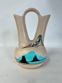 Navajo double Ewer Sgd.