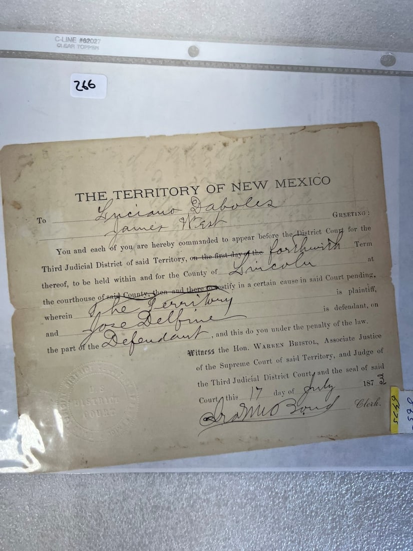 Territory of New Mexico Court Appearance 1873: It is a legal document from the Territory of New Mexico, dated July 17, 1873. It is a summons for Luciano Daboles and James West to appear before the District Court for the Third Judicial District in 