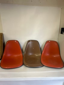 Three Eames Chairs